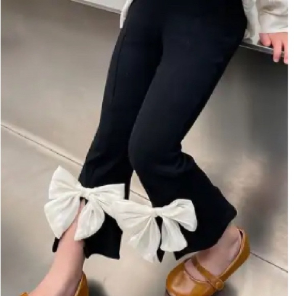 black pants with bows